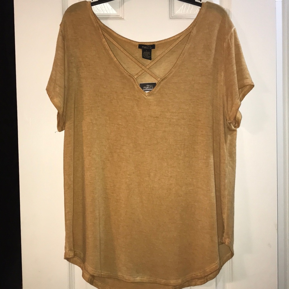 Shirt with crosses at top